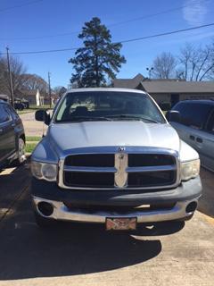 front view of silver Dodge truck