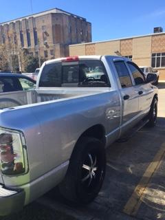back side view of silver Dodge truck